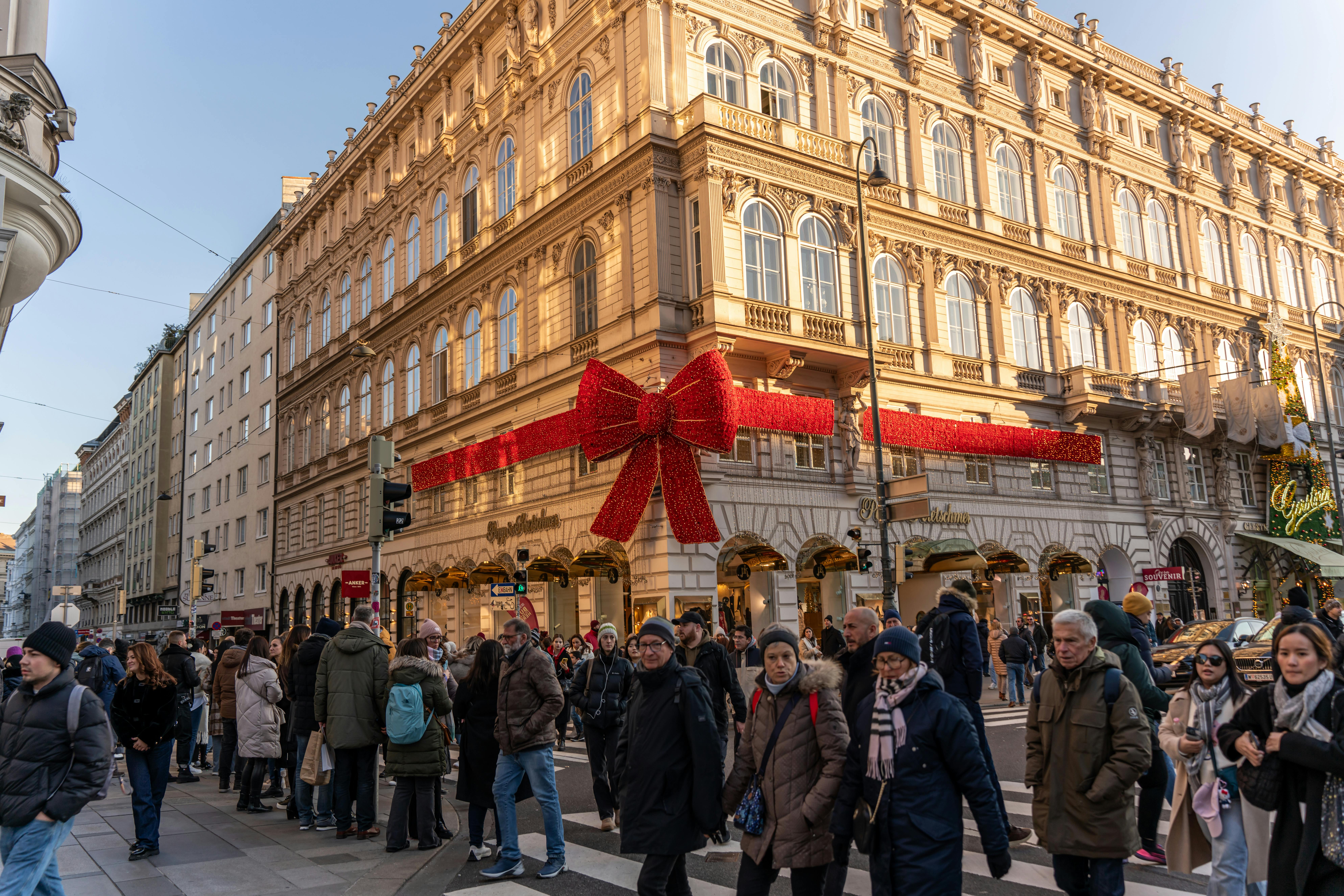 Modern European shopping high street with people and elegant architecture